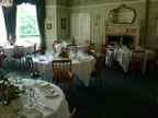 White Chair Covers and Chocolate Taffeta Sash